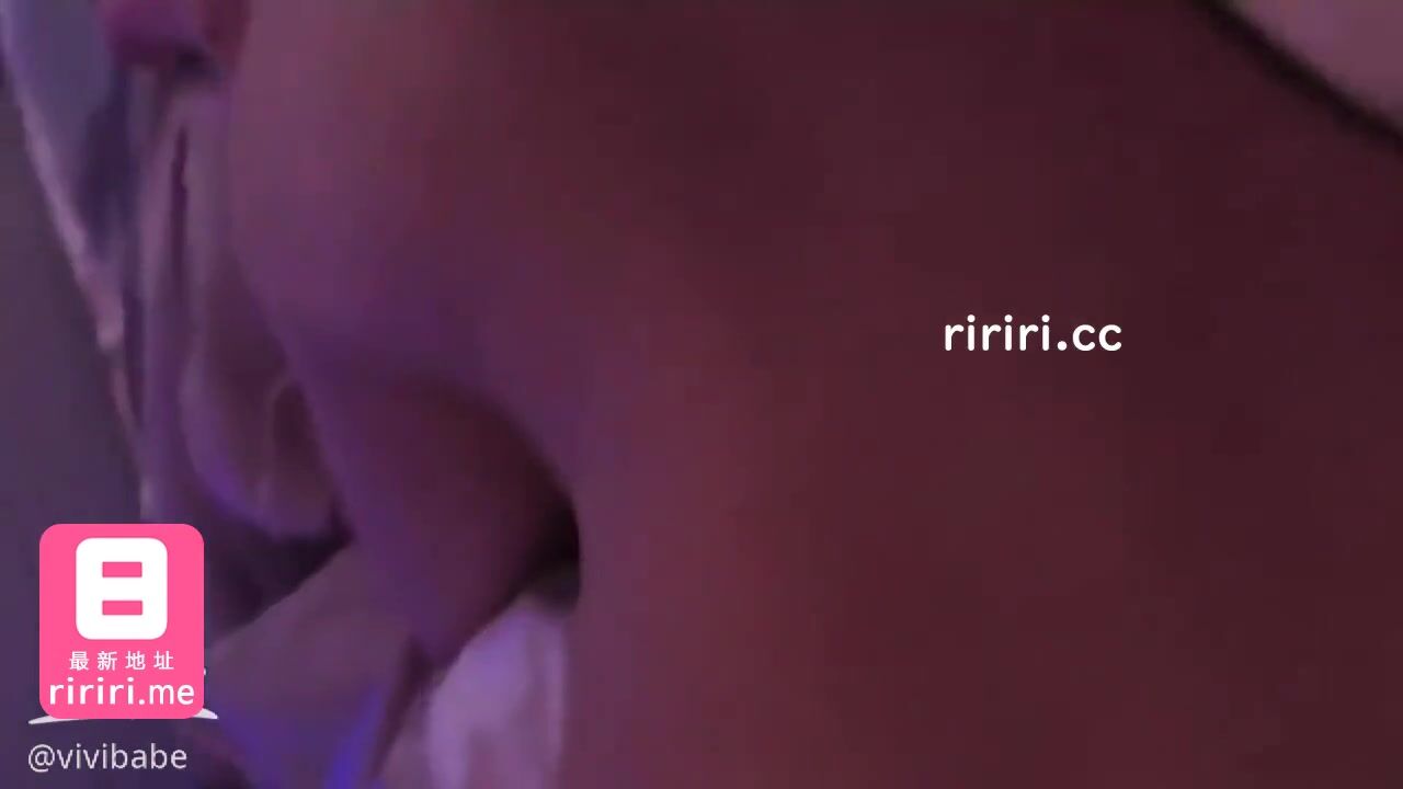 A woman with long dark hair and a playful expression posing provocatively for Aprillady Swag